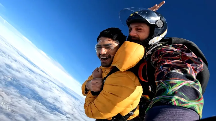 Nayan Bhatia skydiving over Monterey Bay